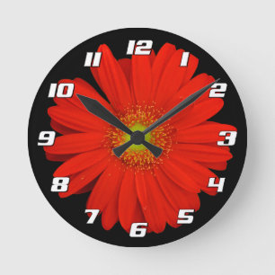 Orange Gerbera Daisy Flower on black with Numbers Round Clock