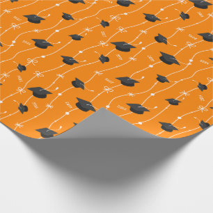 Orange Graduation Caps and Ribbon Wrapping Paper