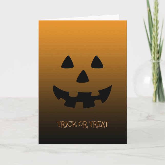 orange Halloween pumpkin face greeting card (Front)