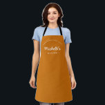 Orange Homemade with Love Custom Your Kitchen Apron<br><div class="desc">Get ready to unleash your culinary creativity with our Orange Homemade with Love Custom Your Kitchen Apron. This apron is a must-have for any passionate baker or cook who wants to add a personal touch to their kitchen attire. Customise the apron with your name, making it uniquely yours and adding...</div>