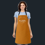 Orange Homemade with Love Custom Your Kitchen Apron<br><div class="desc">Get ready to unleash your culinary creativity with our Orange Homemade with Love Custom Your Kitchen Apron. This apron is a must-have for any passionate baker or cook who wants to add a personal touch to their kitchen attire. Customise the apron with your name, making it uniquely yours and adding...</div>