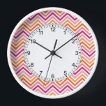 Orange & Hot Pink Chevron Pattern Clock<br><div class="desc">A bright and modern design with zigzag patterns. Click on the customise button to make more changes.</div>
