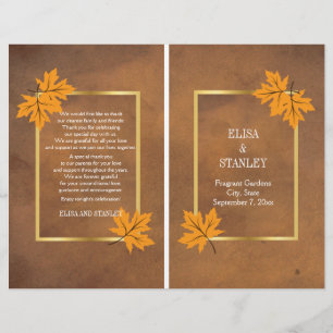 Orange maple leaves on brown wedding program