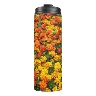 Orange marigold flowers thermal tumbler