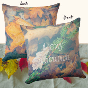 Orange oak leaves under the water cushion