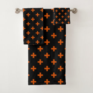 Orange polka crosses on black bath towel set