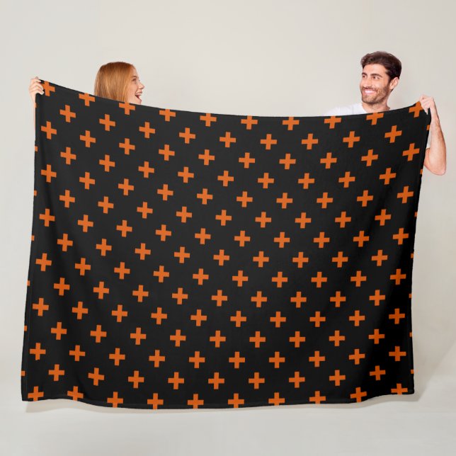 Orange polka crosses on black fleece blanket (In Situ)