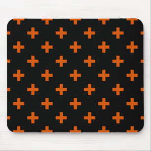 Orange polka crosses on black mouse mat