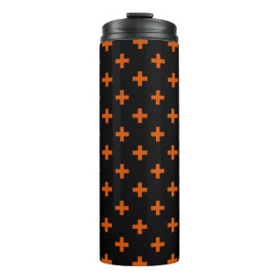 Orange polka crosses on black thermal tumbler