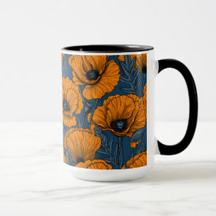 Orange poppies on dark blue mug