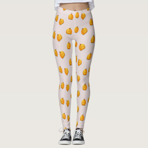 Orange pumpkin head pattern leggings