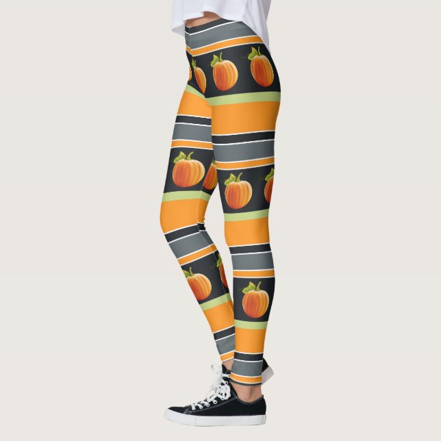 Orange Pumpkin On Vibrant Stripes Pattern Leggings (Left)