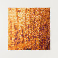 Orange raindrops on glass, abstract background.