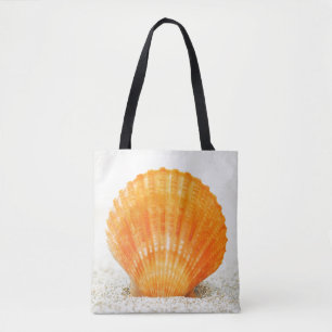 Orange Scallop Shell Standing Upright In Sand Tote Bag