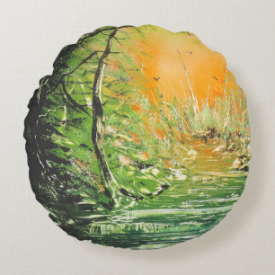 Orange sky through the green forest. round cushion