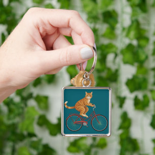 Orange Tabby Cat on a Bicycle Key Ring