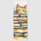 Orange Tabby Cat Perched Atop a Stack of Books