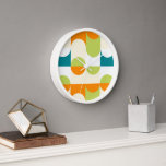 Orange Teal Blue Lime Green Retro Art Pattern Clock<br><div class="desc">Beautiful contemporary orange, ivory cream, white, lime green and teal blue green coloured wavy geometric half circles and squares pattern. Elegant, stylish and eclectic minimalism design for the artistic interior designer, the artsy décor decorator, popular hip trendsetter, vintage retro art style or abstract digital geometric motif lover. Match this design...</div>