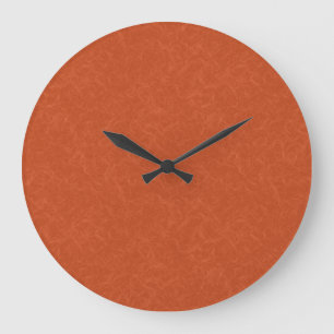 Orange textured surface with swirling pattern large clock