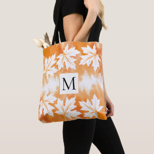Orange watercolor and maple leaves monogram tote bag