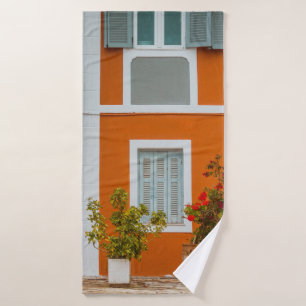 ORANGE WHITE AND GRAY CONCRETE BUILDING BATH TOWEL
