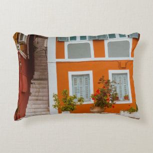 ORANGE WHITE AND GRAY CONCRETE BUILDING DECORATIVE CUSHION