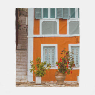 ORANGE WHITE AND GRAY CONCRETE BUILDING FLEECE BLANKET