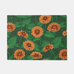 Orange Zinnia flowers, green leaves on dark green Doormat