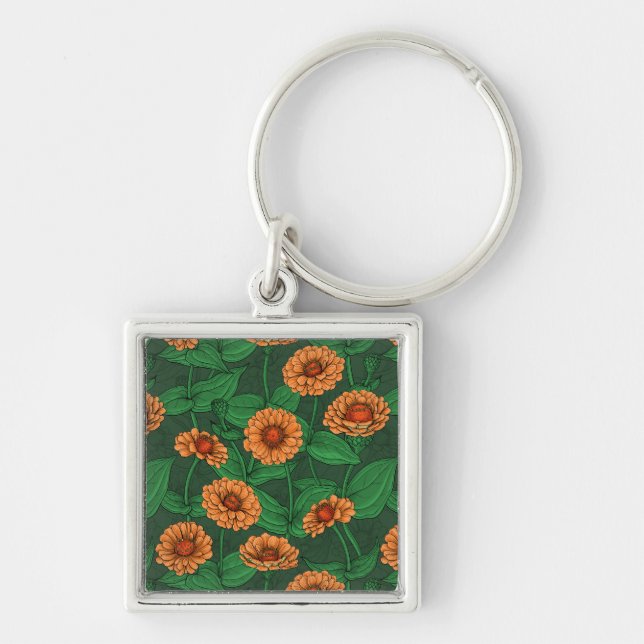 Orange Zinnia flowers, green leaves on dark green Key Ring (Front)