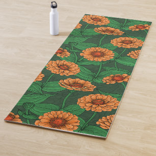 Orange Zinnia flowers, green leaves on dark green Yoga Mat