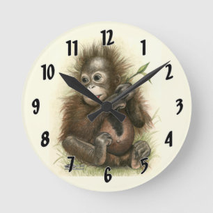 Orangutan Baby With Leaves Round Clock