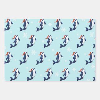 Orca with snowflakes wrapping paper sheet