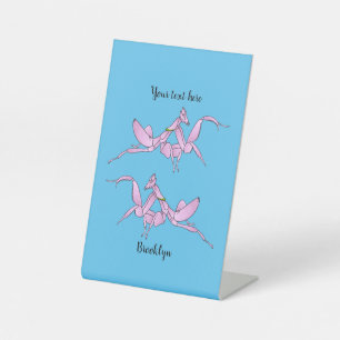 Orchid mantis cartoon illustration pedestal sign