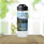 Oregon Mount Hood and Lake Landscape Water Bottle<br><div class="desc">Stay quenched and motivated during your daily workouts with this clear,  plastic water bottle that features a scenic,  landscape photo image of snow capped Mount Hood against the backdrop of a peaceful forest lake. Select your water bottle size and colour. NOTE: Design not optimised for Kid's water bottle style.</div>