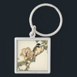 Oriental Bird Perched on Branch Key Ring<br><div class="desc">This art print displays sharp,  vivid image of an oriental bird perched on a branch. Below it there is an orange flower with a high degree of colour accuracy. This contemporary fine art print of a traditional Oriental-inspired art will add character to any wall in your house.</div>
