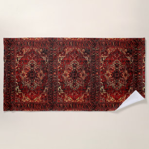 Oriental rug design in dark red beach towel