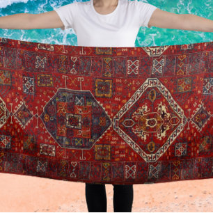 Oriental rug design in  red and blue beach towel