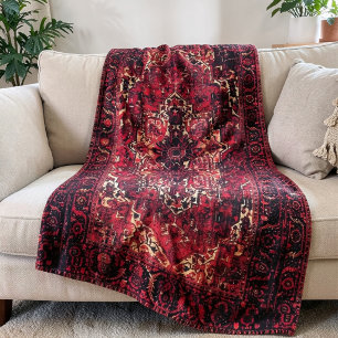 Oriental rug design in vibrant red fleece blanket
