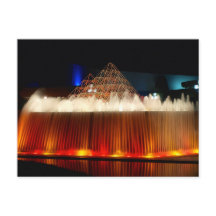 Orlando Theme Park Fountain lit up at night