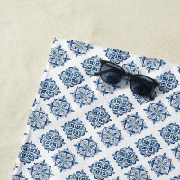 Ornament embroidered blue on white