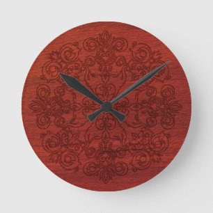 Ornament Engraved on Rustic Dark Red Wood Round Clock