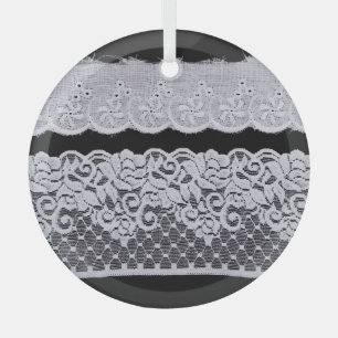 Ornamental white lace, isolated black background. glass tree decoration