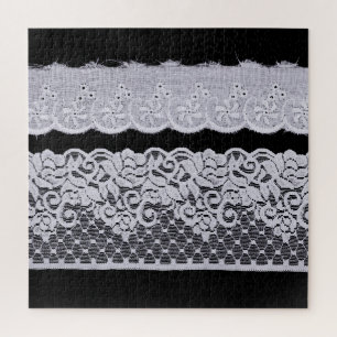 Ornamental white lace, isolated black background. jigsaw puzzle