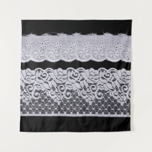 Ornamental white lace, isolated black background. tapestry