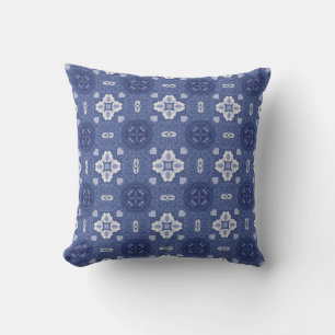 Ornate blue and white floral tile pattern cushion