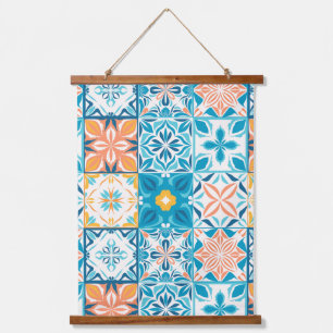 Ornate tiles in blue and orange hanging tapestry