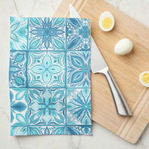 Ornate tiles in blue and orange tea towel