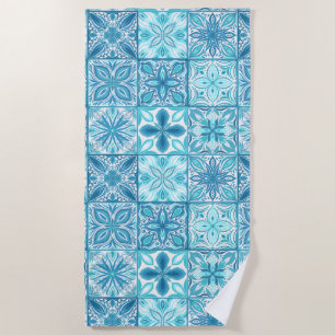 Ornate tiles in blue and white beach towel