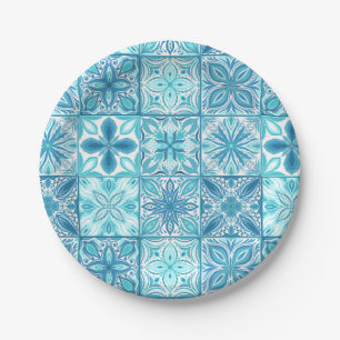 Ornate tiles in blue and white paper plate