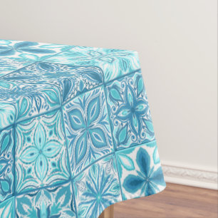 Ornate tiles in blue and white tablecloth